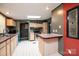 Cozy kitchen with light wood cabinetry, breakfast bar, and lots of sunlight at 51 Emily Ln, Taylorsville, NC 28681