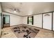 Inviting living room with carpet and a ceiling fan, featuring a convenient doorway at 51 Emily Ln, Taylorsville, NC 28681