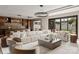 Spacious living room featuring a comfortable sofa, modern lighting, and seamless flow at 5432 Carmel Rd, Charlotte, NC 28210
