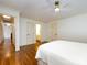 Bright bedroom with hardwood floors with access to an ensuite bath and multiple closets at 5816 Valley Stream Trl, Waxhaw, NC 28173