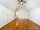 Spacious bonus room with hardwood floors and ample storage spaces at 5816 Valley Stream Trl, Waxhaw, NC 28173