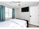 Comfortable bedroom with ceiling fan, ample natural light, and closet at 5953 Prescott Ct # 3105, Charlotte, NC 28269