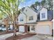 Well-maintained townhomes with attached garages, offering comfortable living and convenient parking at 5953 Prescott Ct # 3105, Charlotte, NC 28269