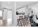 View of the kitchen with bar stool seating overlooking the cooking area at 5953 Prescott Ct # 3105, Charlotte, NC 28269