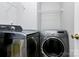 Practical laundry room area featuring a side-by-side washer and dryer for convenient chores at 5953 Prescott Ct # 3105, Charlotte, NC 28269