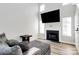 Inviting living room with a fireplace, large windows, and cozy seating, perfect for relaxation at 5953 Prescott Ct # 3105, Charlotte, NC 28269