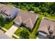 An aerial view showcasing the home's well-maintained lawn, landscaping, and location within a neighborhood at 6038 Durango Way, Denver, NC 28037