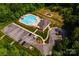Aerial view of community pool, playground, clubhouse, and parking lot at 6038 Durango Way, Denver, NC 28037