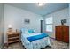 Inviting bedroom with comfortable bed, soft lighting, and serene decor at 6038 Durango Way, Denver, NC 28037