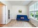 Bright bedroom with large window and a futon providing comfortable seating at 6038 Durango Way, Denver, NC 28037