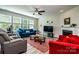 Comfortable living room with plenty of natural light and a fireplace at 6038 Durango Way, Denver, NC 28037