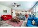 Bright living room featuring an open floor plan, hardwood floors, and stylish furnishings at 6038 Durango Way, Denver, NC 28037