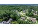 Expansive aerial view of a home in a wooded area with a private swimming pool at 73 41St Nw Ave, Hickory, NC 28601
