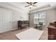 Neutral Bedroom with a dark wood crib, comfortable chair, and soft rug, creating a serene atmosphere at 73 41St Nw Ave, Hickory, NC 28601