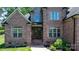 Inviting front entrance with double glass doors and brick steps at 73 41St Nw Ave, Hickory, NC 28601