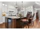 Gourmet kitchen featuring a large island with seating and pendant lighting at 73 41St Nw Ave, Hickory, NC 28601