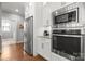 Modern kitchen with stainless steel appliances and white cabinetry at 73 41St Nw Ave, Hickory, NC 28601