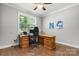 Bright office space with natural light, a wooden desk, and hardwood floors at 73 41St Nw Ave, Hickory, NC 28601