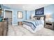 Nautical themed bedroom with blue walls, carpeted floors, and stylish wooden furniture at 7335 Childress Dr, Concord, NC 28025