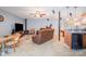 Finished basement with a kitchenette, TV, and ample seating ideal for recreation at 7545 Rabbit Cir, Denver, NC 28037