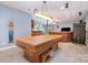 Basement featuring a pool table, tile floors, and a seating area perfect for entertaining guests at 7545 Rabbit Cir, Denver, NC 28037
