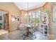 A breakfast nook with a charming round table and bay window at 7545 Rabbit Cir, Denver, NC 28037