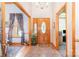 Inviting foyer with hardwood floors, a decorative front door, and elegant trim at 7545 Rabbit Cir, Denver, NC 28037