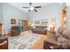 Spacious living room with hardwood floors, high ceilings, and comfortable seating at 7545 Rabbit Cir, Denver, NC 28037