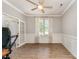 Comfortable office featuring natural light, ceiling fan, and classic trim at 7642 Rolling Meadows Ln, Huntersville, NC 28078