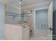 This bright bathroom includes a stone shower with light-blue walls at 8800 Covey Rise Ct, Charlotte, NC 28226