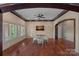 This bright dining room has hardwood floors, and a view of the yard outside at 8800 Covey Rise Ct, Charlotte, NC 28226
