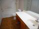 Bathroom showing countertop, sink, toilet, mirror, and bath with shower at 9139 Charminster Ct, Charlotte, NC 28269