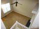 Carpeted hallway area with ceiling fan and a view of natural light from a window at 9139 Charminster Ct, Charlotte, NC 28269