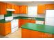 Functional kitchen features white appliances, laminate counters, and convenient layout at 9139 Charminster Ct, Charlotte, NC 28269