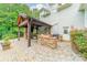 Outdoor kitchen features stone countertops and a built in grill at 9202 Arlington Hills Dr, Mint Hill, NC 28227