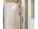 This bathroom features a shower with tiled walls and modern fixtures at 9410 Greenbank Ct, Charlotte, NC 28214