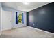 This bedroom features neutral carpet and a window with views of the outdoors at 1005 Exodus Ct, Monroe, NC 28110