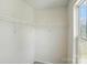 Empty closet features shelving for organizing clothes and accessories at 1005 Exodus Ct, Monroe, NC 28110