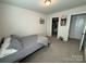 Comfortable bedroom featuring a bed, closet space, and soft carpeting at 1016 Laggan Ln, Indian Trail, NC 28079