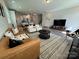 Living room featuring neutral tones, hardwood floors, and a modern open floor plan at 1016 Laggan Ln, Indian Trail, NC 28079