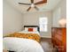 Comfortable bedroom with a ceiling fan and ample natural light at 10639 Secret Garden Ln, Charlotte, NC 28214