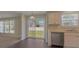 Bright kitchen with stainless steel appliances, white cabinets, and access to the backyard at 1111 Balcorn Pl, Charlotte, NC 28214