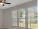 Bright living room features neutral walls, and windows with beautiful, natural light at 1111 Balcorn Pl, Charlotte, NC 28214