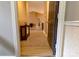 Welcoming hallway featuring light, wood-look floors and a neutral color palette, creating a warm entry at 11867 Ridgeway Park Dr, Charlotte, NC 28277