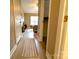 Hallway leading to a bedroom offers natural light and a view of the bedroom at 11867 Ridgeway Park Dr, Charlotte, NC 28277