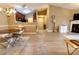Open-concept living area seamlessly connects the dining area, kitchen, and living room space at 11867 Ridgeway Park Dr, Charlotte, NC 28277