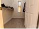 Walk-in closet featuring custom shelving and a convenient full-length mirror at 11867 Ridgeway Park Dr, Charlotte, NC 28277