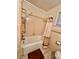 Small bathroom features a shower-tub, ceramic tile, and neutral colors at 1229 Rocky Face Church Rd, Taylorsville, NC 28681