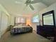 Tranquil bedroom with neutral carpet, a ceiling fan and good natural light at 1229 Rocky Face Church Rd, Taylorsville, NC 28681