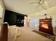 Spacious bedroom with carpet, ceiling fan, and a closet for ample storage at 1229 Rocky Face Church Rd, Taylorsville, NC 28681